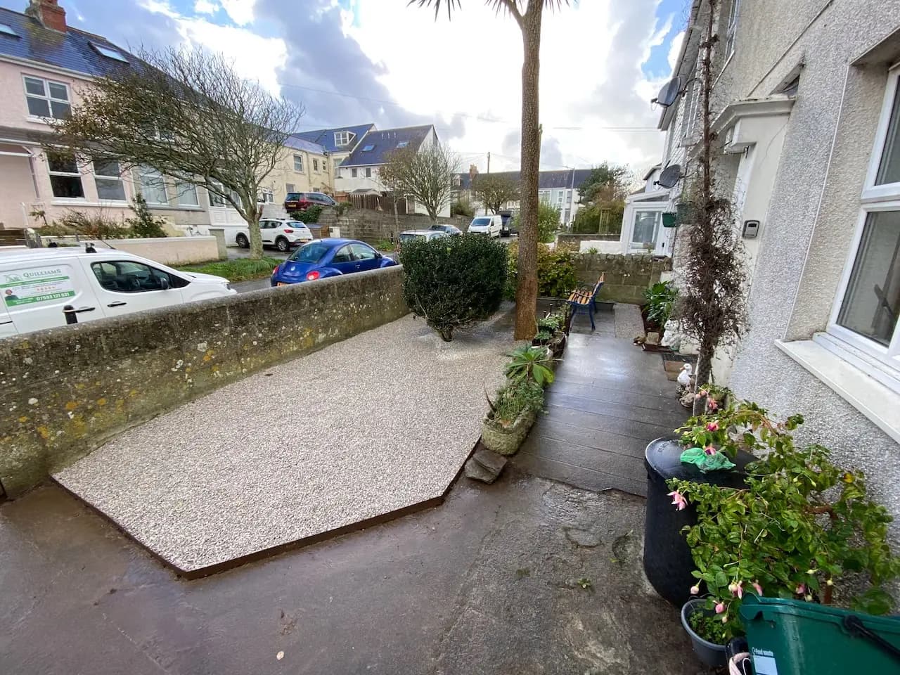 Freshly mown lawn with trimmed hedges in a private garden